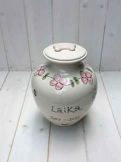large pink dog urn