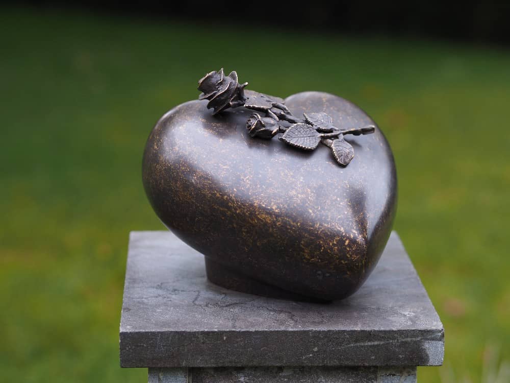 large bronze heart urn with roses