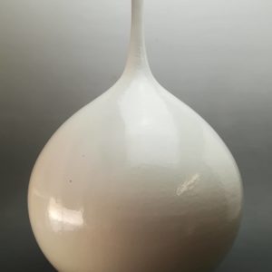 white ceramic urn for ashes
