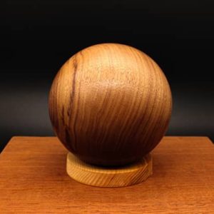 dark round wood urn for ashes