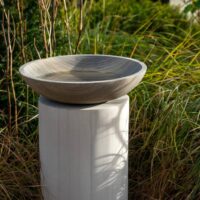 taupe birdbath on taupe column