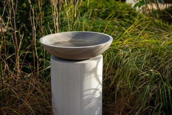 taupe birdbath with cream stone column