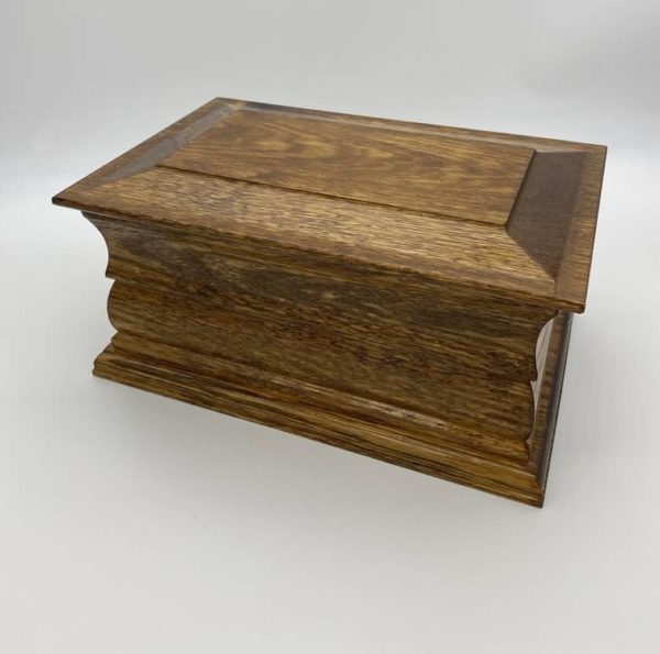stained oak casket for ashes