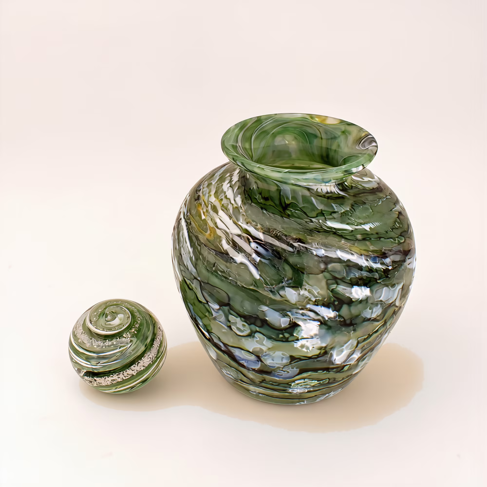 green glass cremation urn
