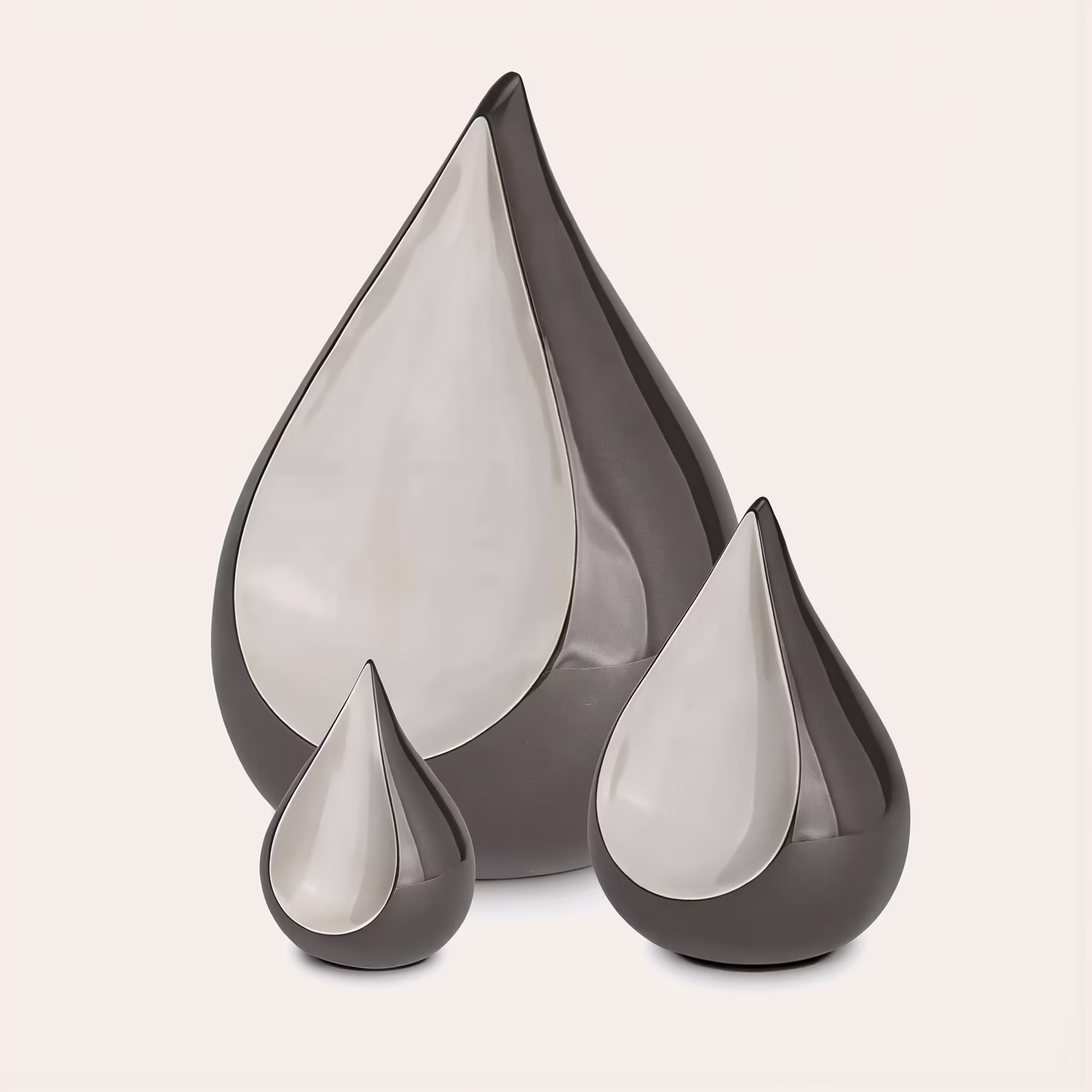 black teardrop shaped urns